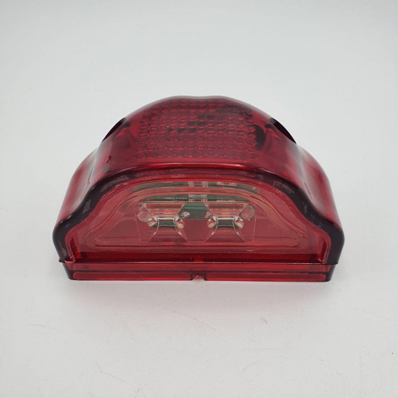 Фонарь подсветки номера в красном полупрозрачном корпусе 24V
